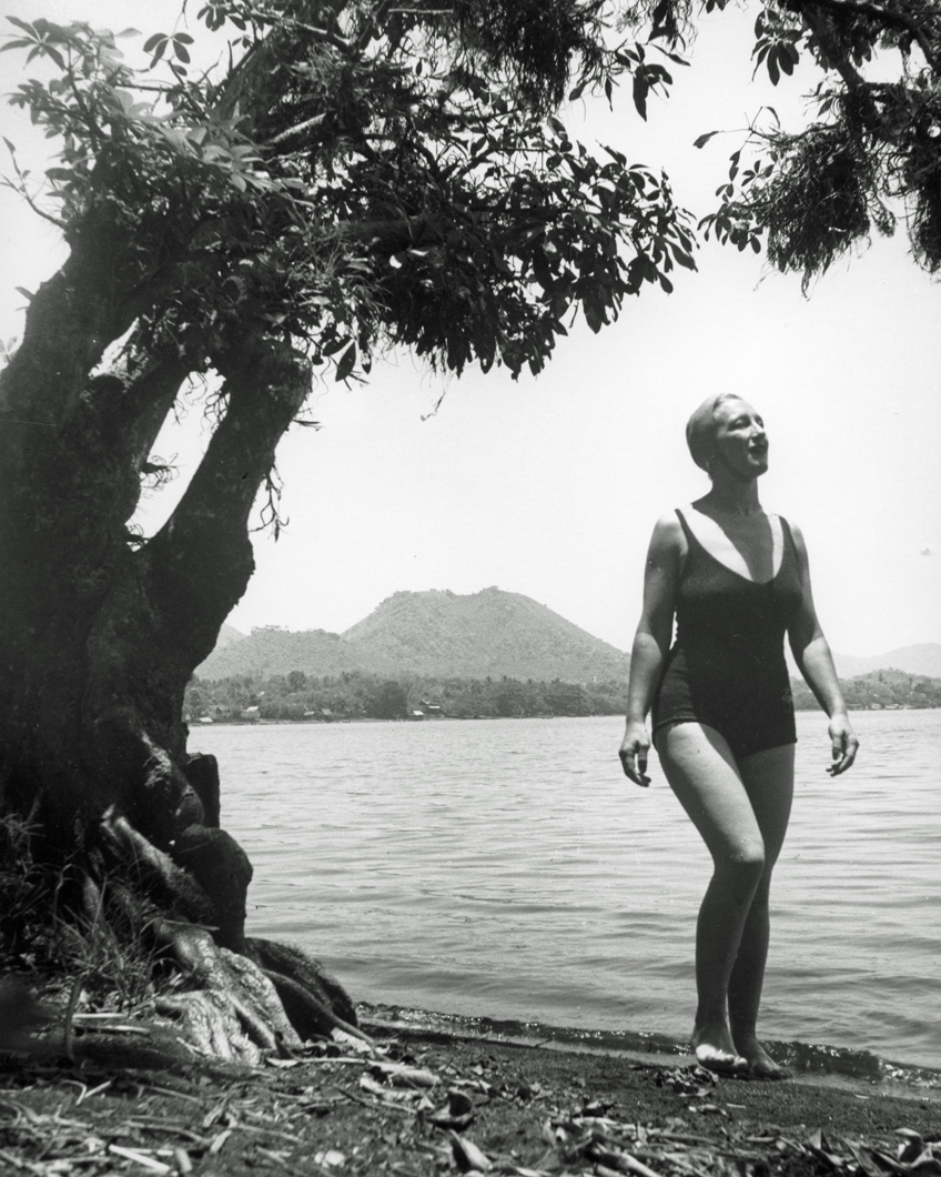 Esperanza Lopez Mateos in bathing suit beside lake in Southern Mexico